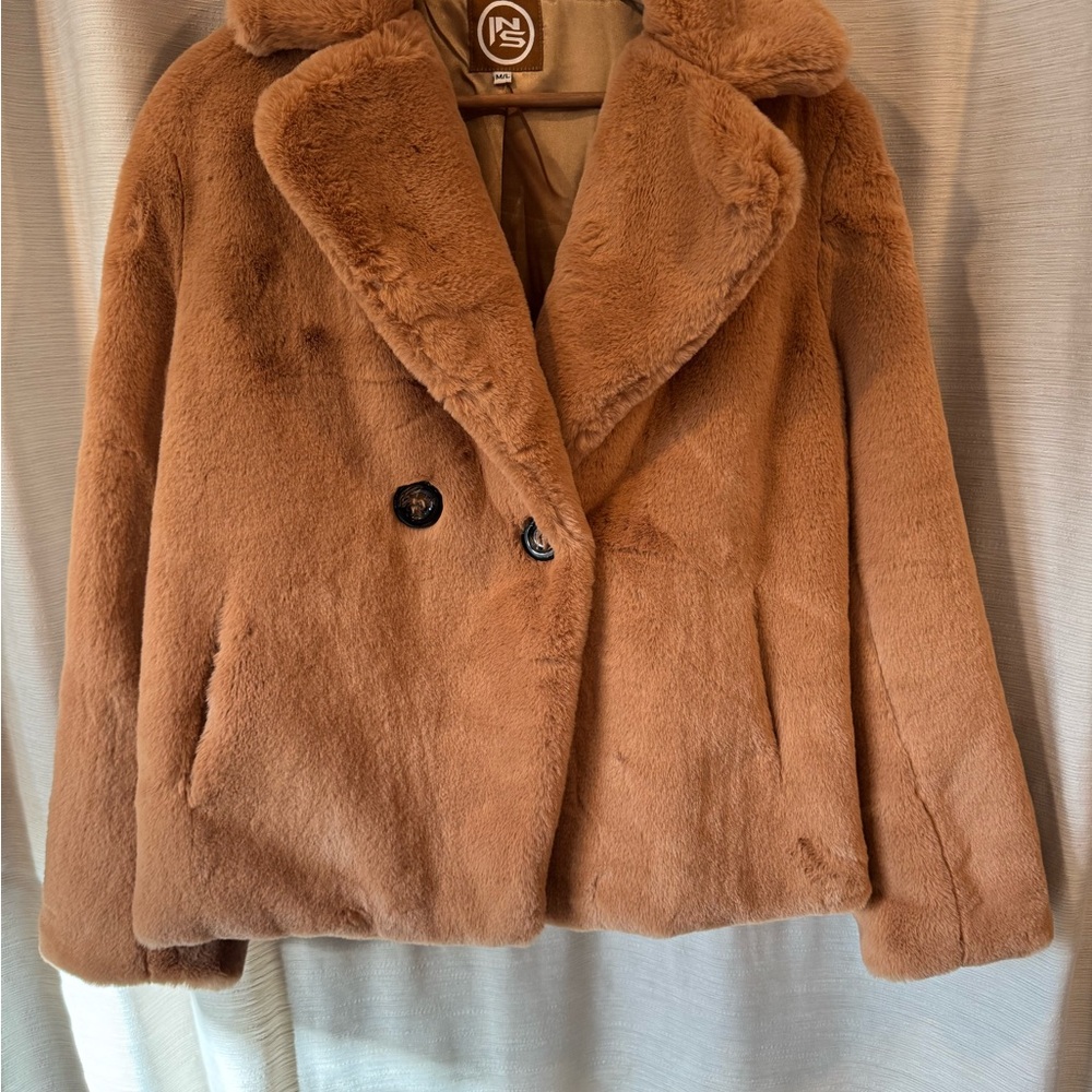 Pink faux fur jacket, size M/L. Lined with single button closure.